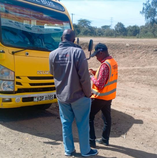 ntsa official inspect a yellow school bus