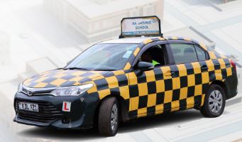AA Driving school car with yellow and Green Marking