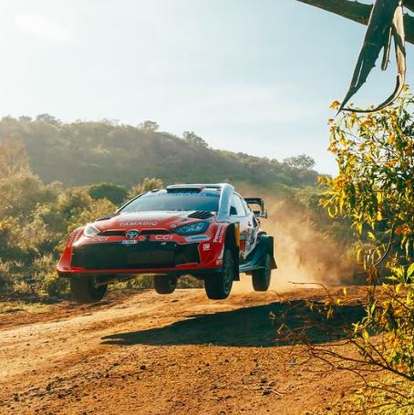 safari rally with tyres raised
