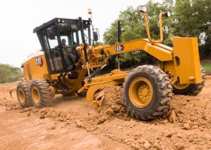 Yellow Motor Grader on a Field