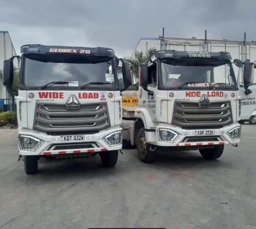 two HOWO Prime movers parked