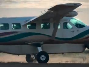 an aircraft parked at maasai mara national reserve