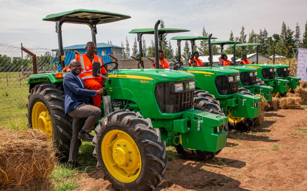 John deere tractors arranged in a row