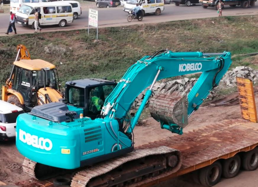 Excavator with breaker for hire